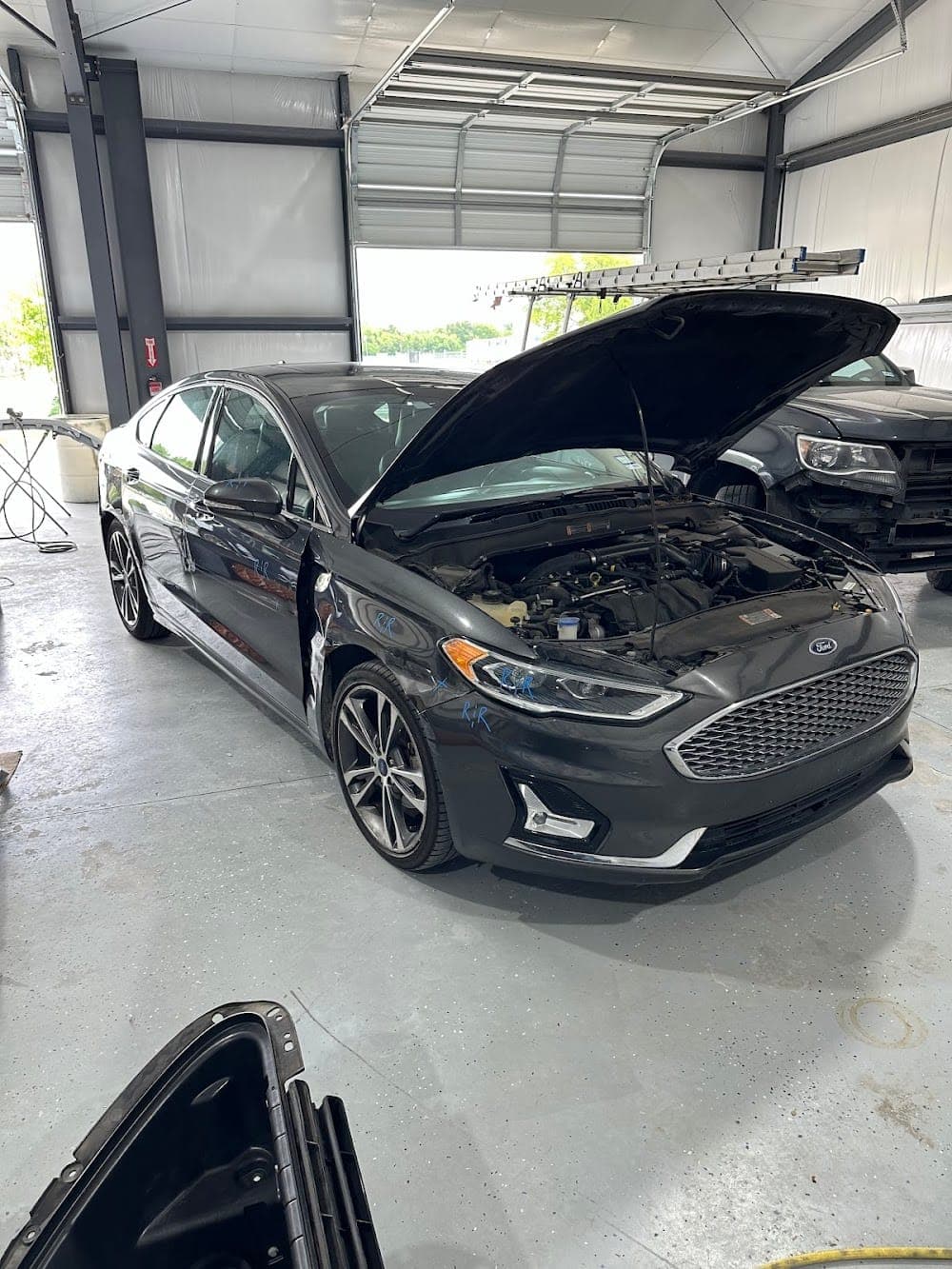 Vehicle side damage photo from Collision Kings Auto Body of McKinney
